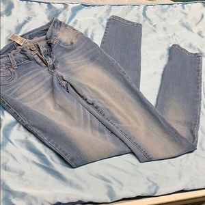 Never worn solid blue jeans